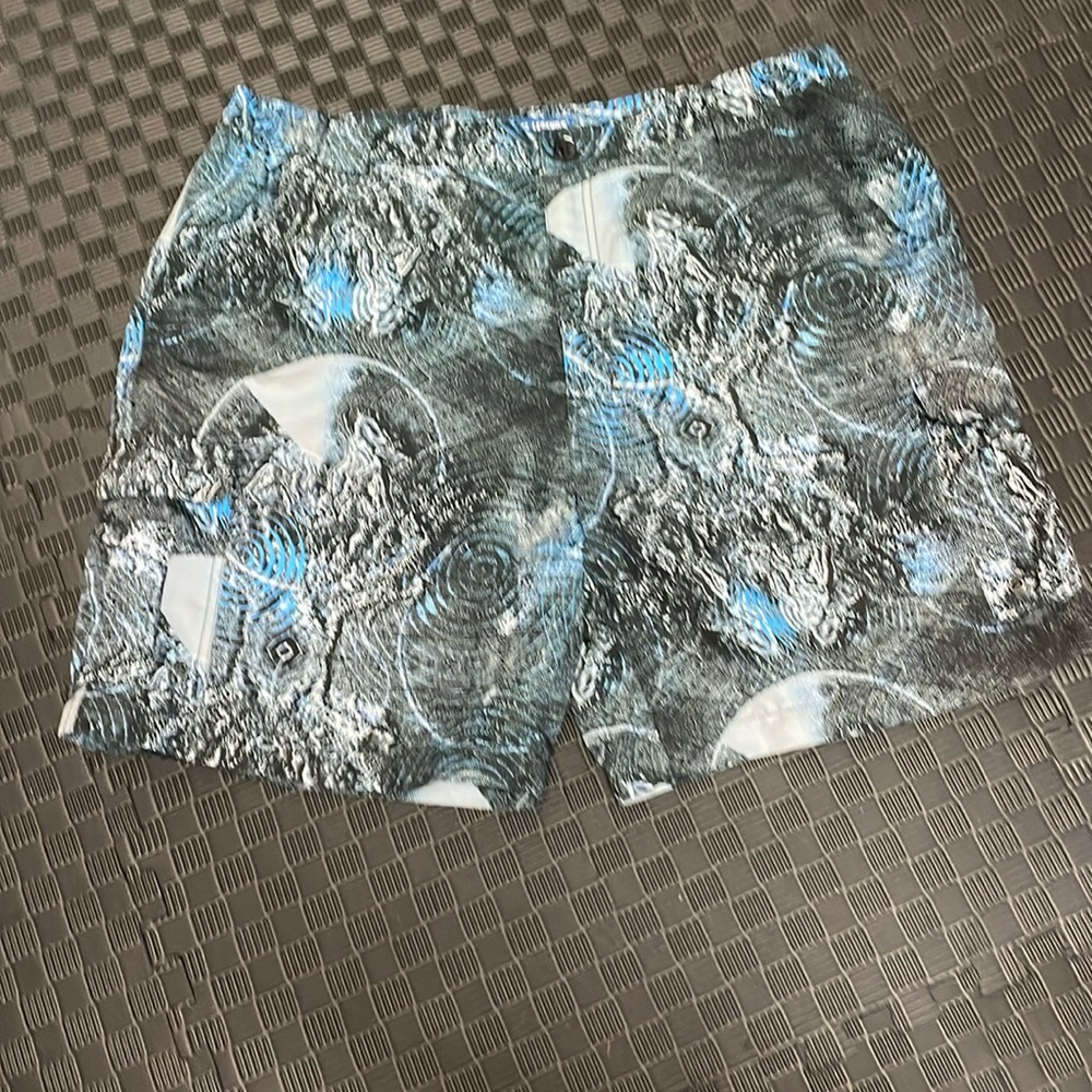 Reel Legends performance cargo shorts. Black and blue sonar design size XL